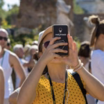 An image of a tourist taking a photo